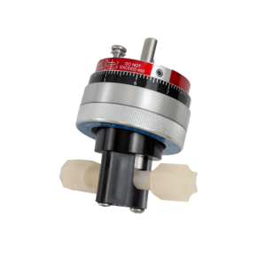 Cylindrical mechanical control pump head dial with red, black, and silver segments, and protruding white-colored connectors