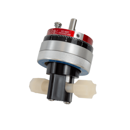 Cylindrical mechanical control pump head dial with red, black, and silver segments, and protruding white-colored connectors